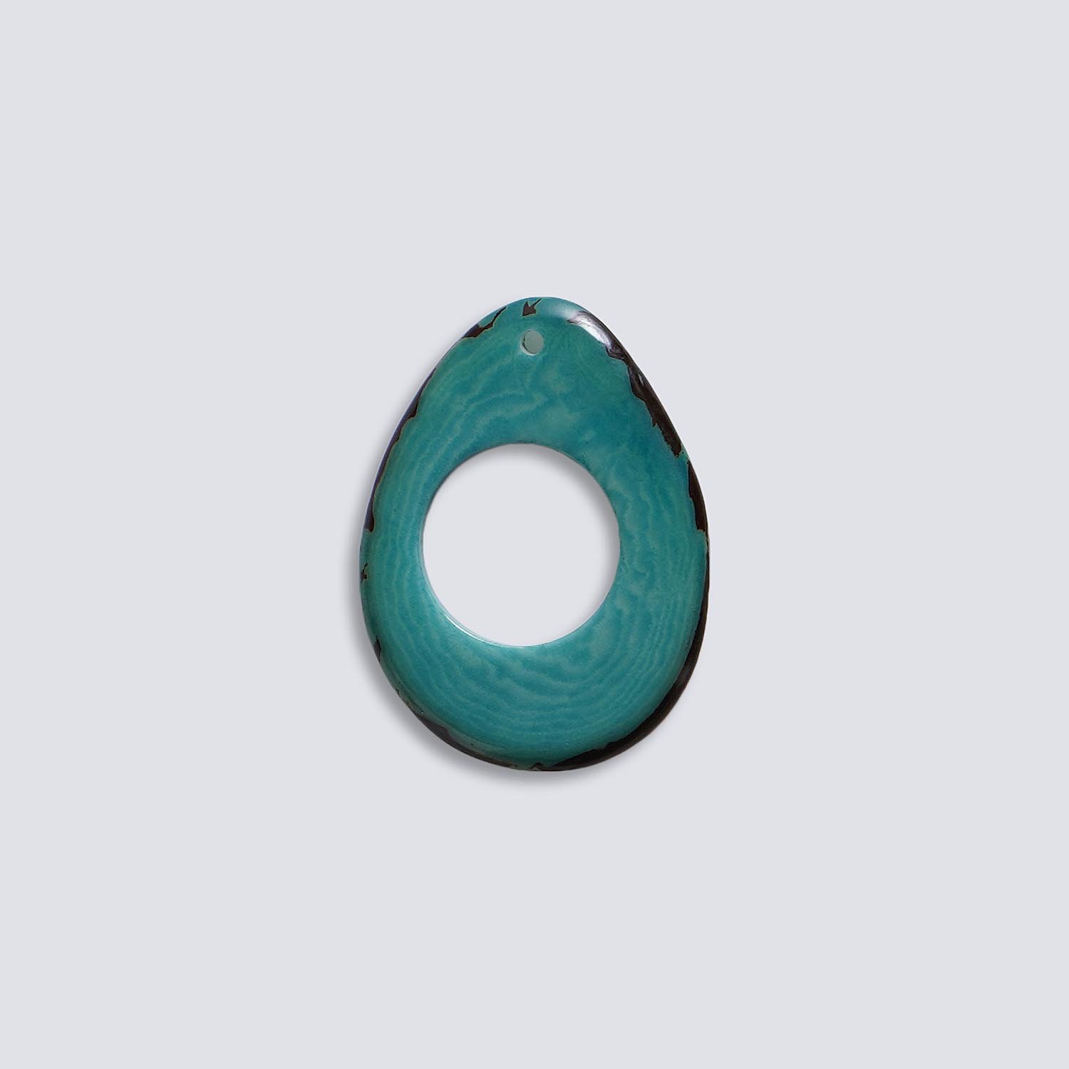 Tagua colorata Petalo forato azzurro